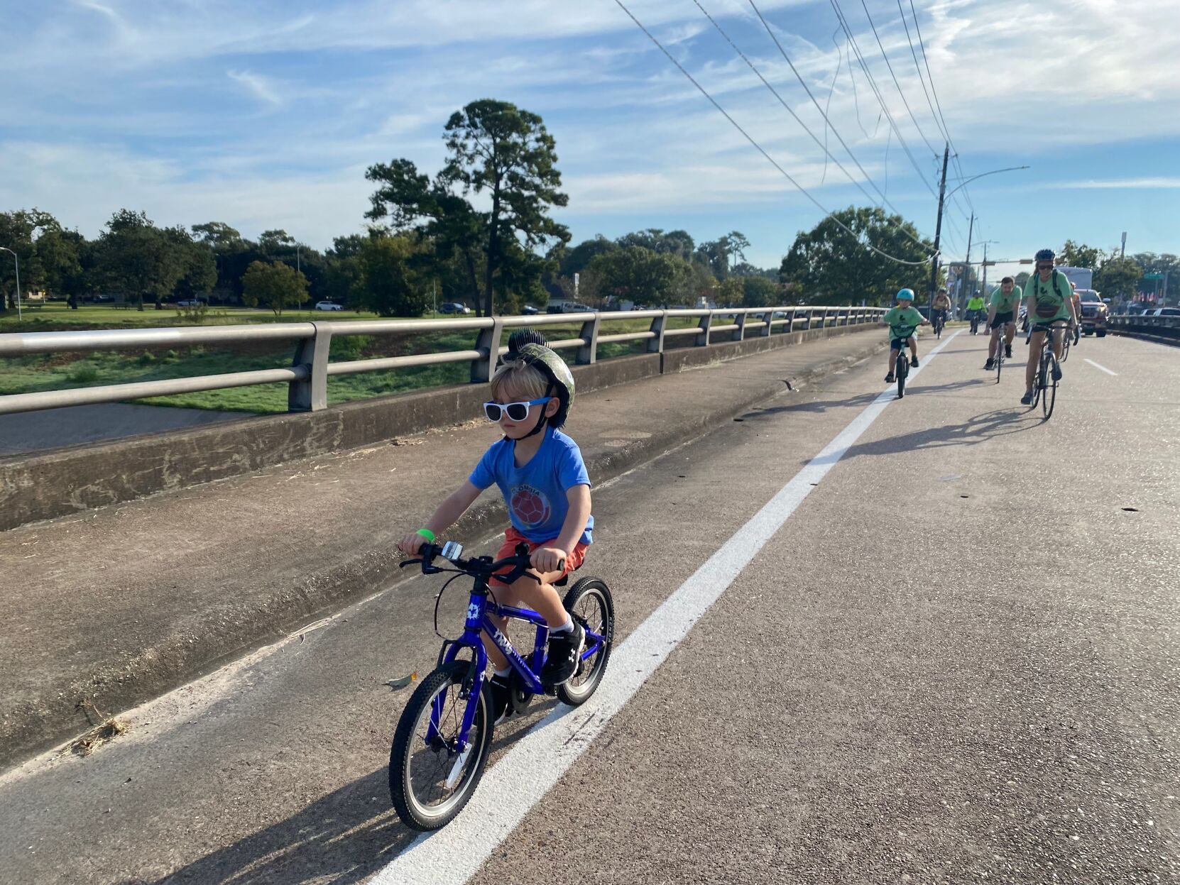 Tour de Oak Forest Kid on Bridge 1